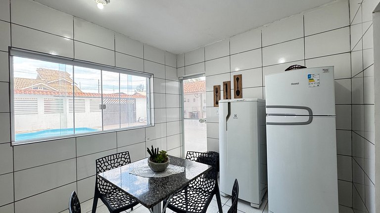 100M da praia -Piscina -Churrasqueira- 4 quartos.